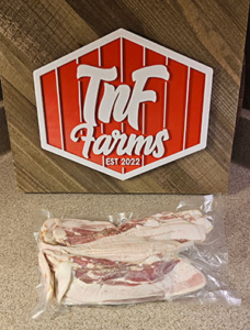 1-1/2 pound package of American Guinea hog bacon