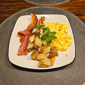 American Guinea hog bacon, free range non GMO farm fresh eggs and potatoes