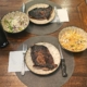 these ribeye steaks have had a few minutes to rest after being on the griddle.