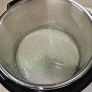 Rinsed white rice in a rice cooker