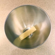 stick of butter in a mixing bowl
