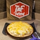 Breakfast pizza is hot out of the oven at TnF Farms!