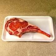 tomahawk steak with the packaging removed